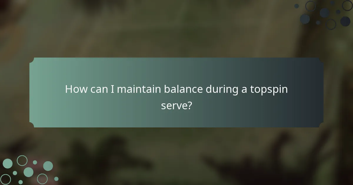 How can I maintain balance during a topspin serve?