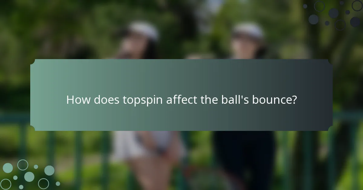 How does topspin affect the ball's bounce?